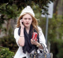 http://celebrity-bags.com/celebrity_bags/dakota-fanning-saving-her-outfit-with-a-balenciaga-handbag