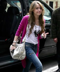 Miley Cyrus And Her Love For Luis Vuitton Handbags